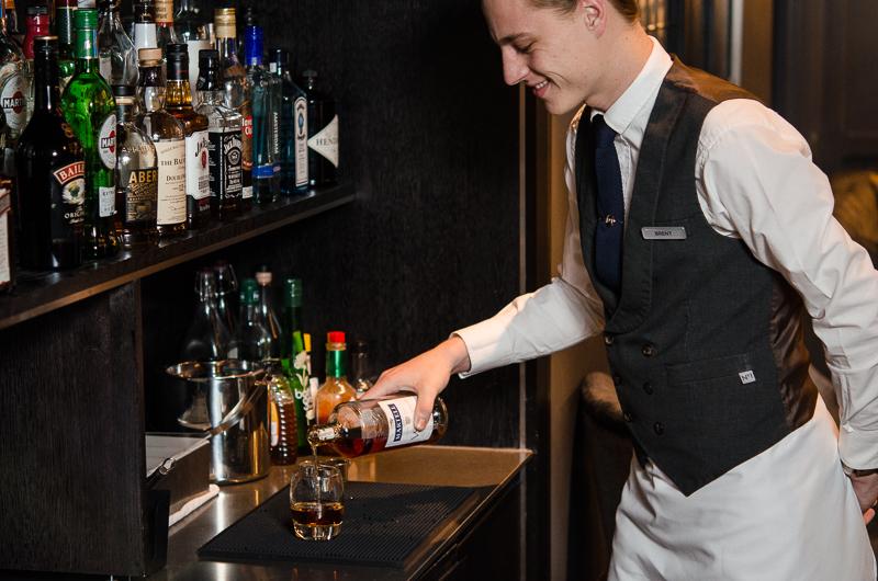 Clubrooms Gatwick South Bartender Pouring Drink