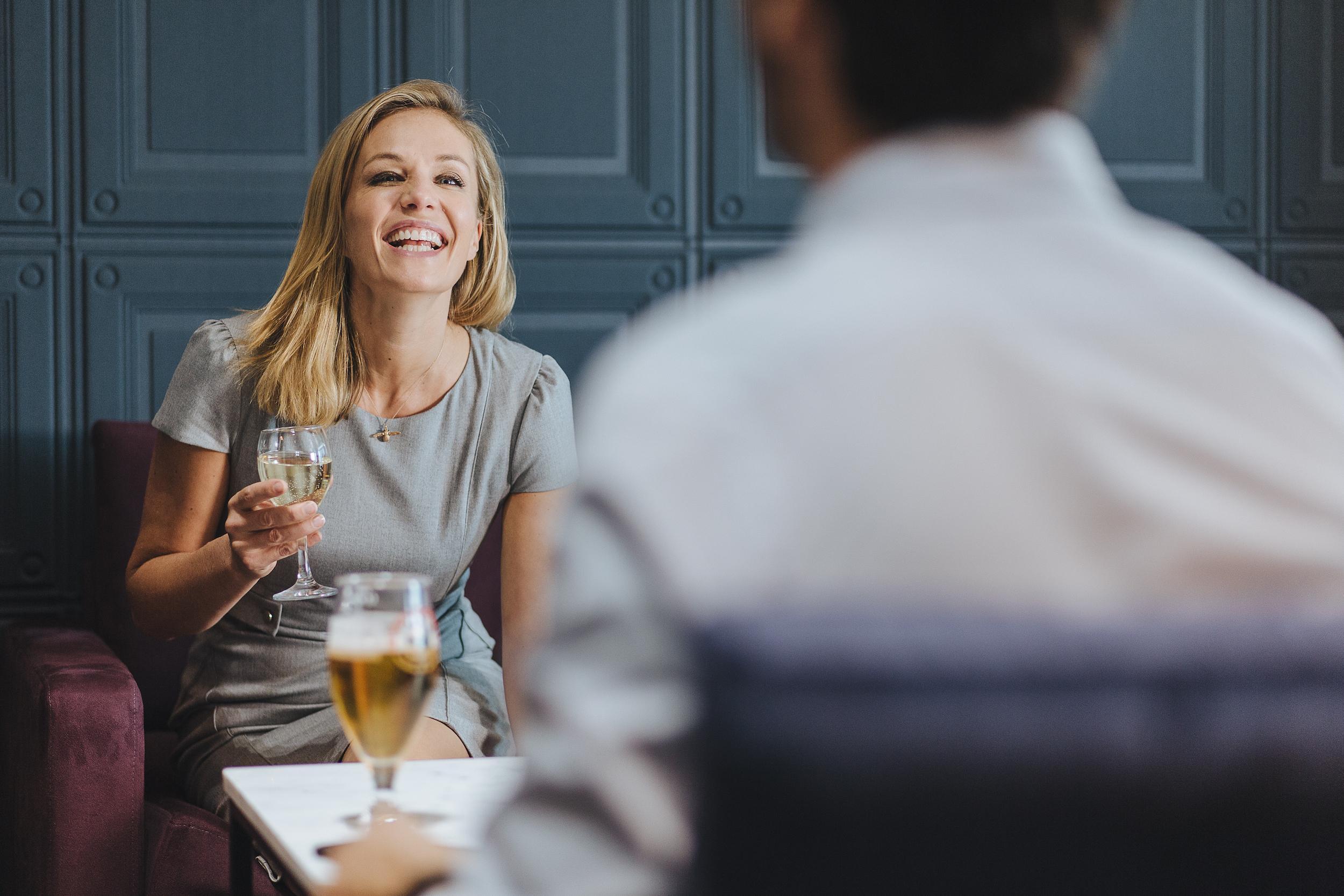 Club Aspire Lounge Guests Chatting